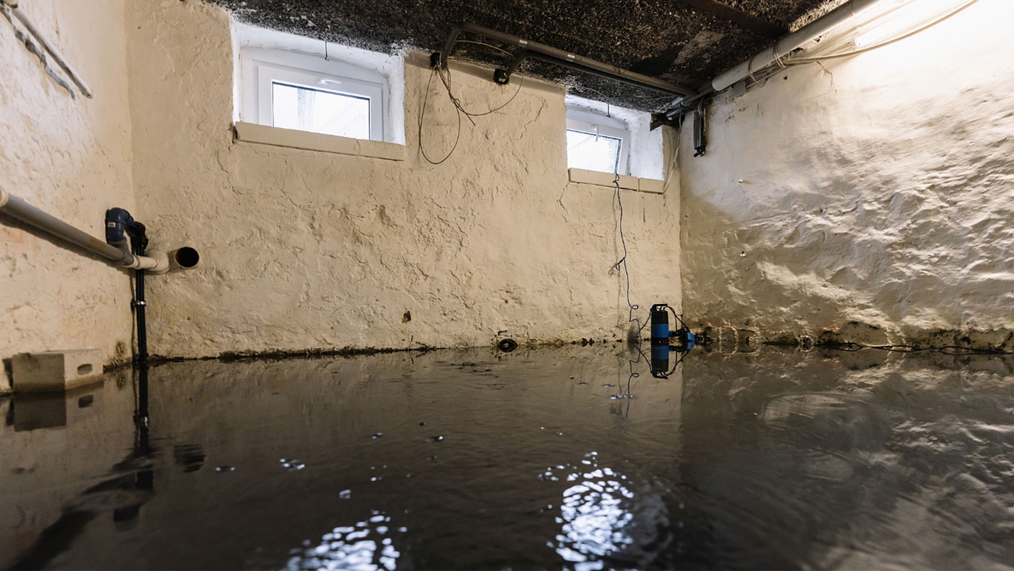 A basement flooded with a few inches of water.